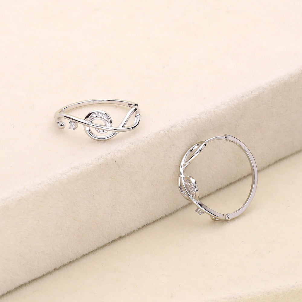 Flatlay view of Treble Clef Music Note CZ Hoop Earrings in Sterling Silver 0.9 inch, 4 of 6