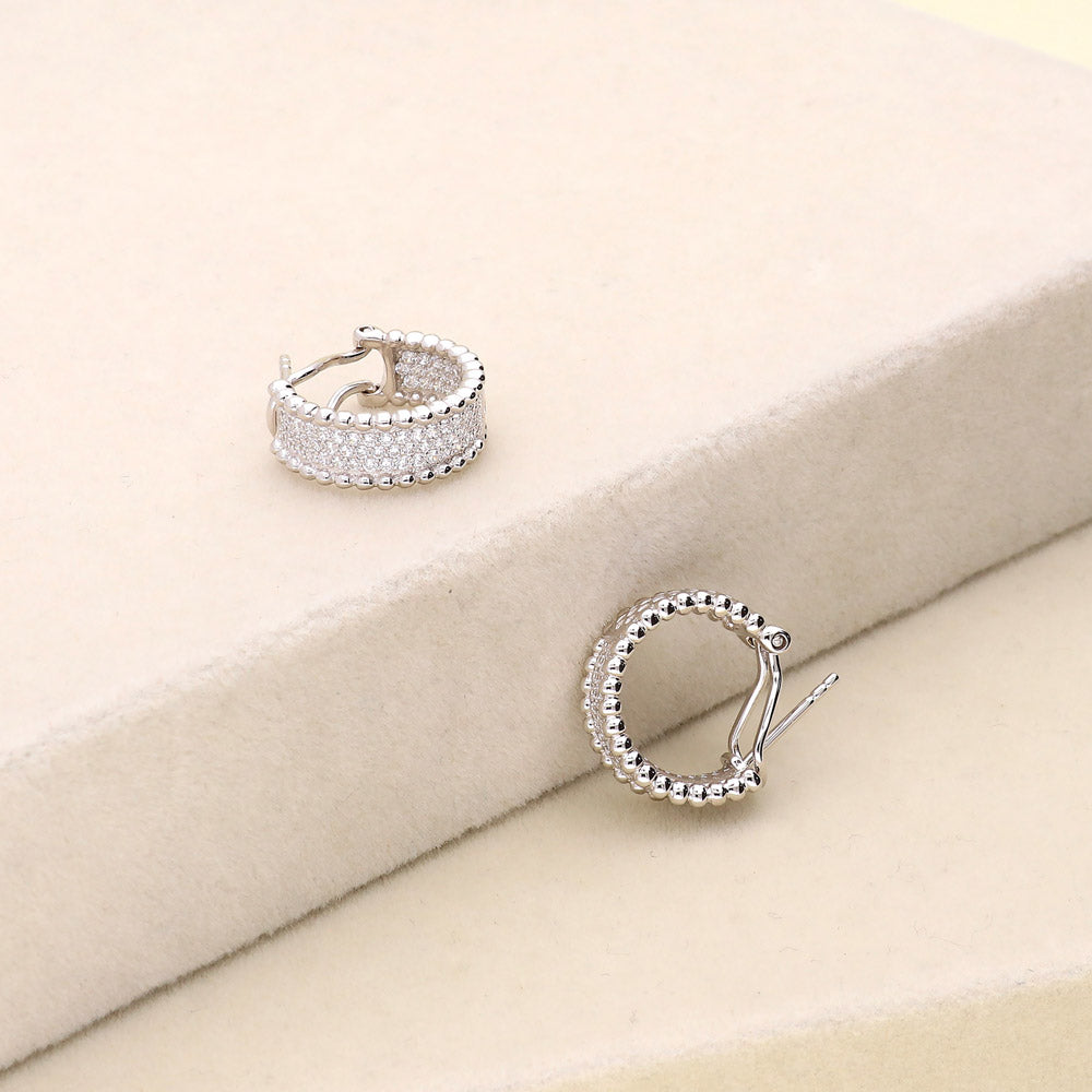 Flatlay view of Bead CZ Small Omega Back Hoop Earrings in Sterling Silver 0.7 inch, 3 of 6
