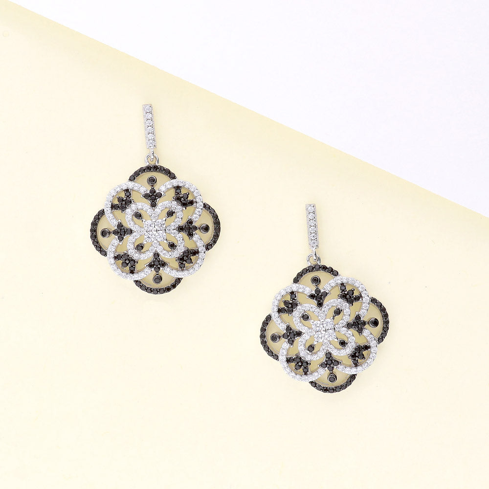 Flatlay view of Flower Black and White CZ Earrings in Sterling Silver, 5 of 8