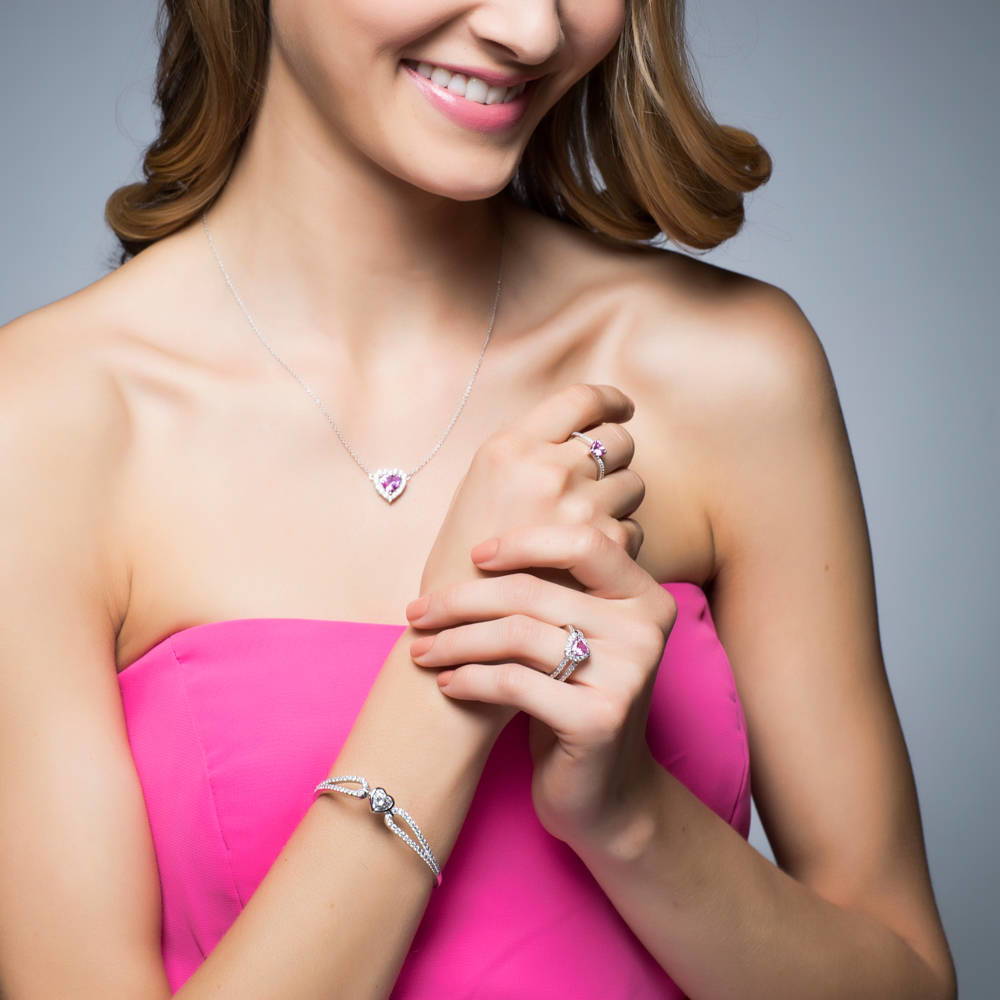 Model wearing Halo Heart Pink CZ Pendant Necklace in Sterling Silver, 3 of 7