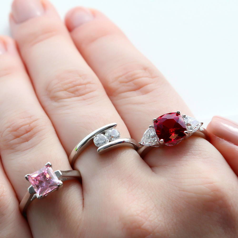 Image Contain: Model Wearing 2-Stone Ring, 3-Stone Ring, Solitaire Ring