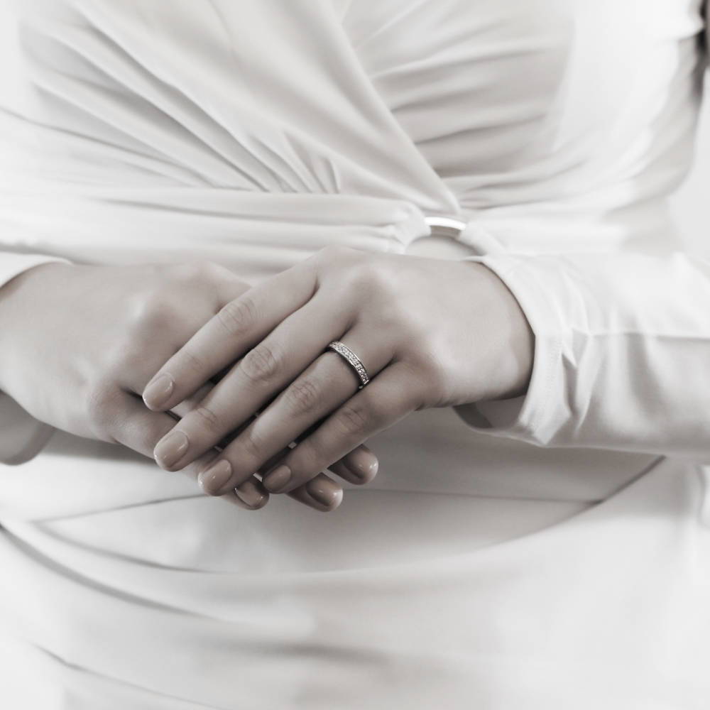 Model wearing Pave Set CZ Half Eternity Ring in Sterling Silver