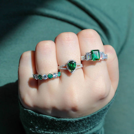 Image Contain: Model Wearing 3-Stone Ring, 7-Stone Ring, Halo Split Shank Ring