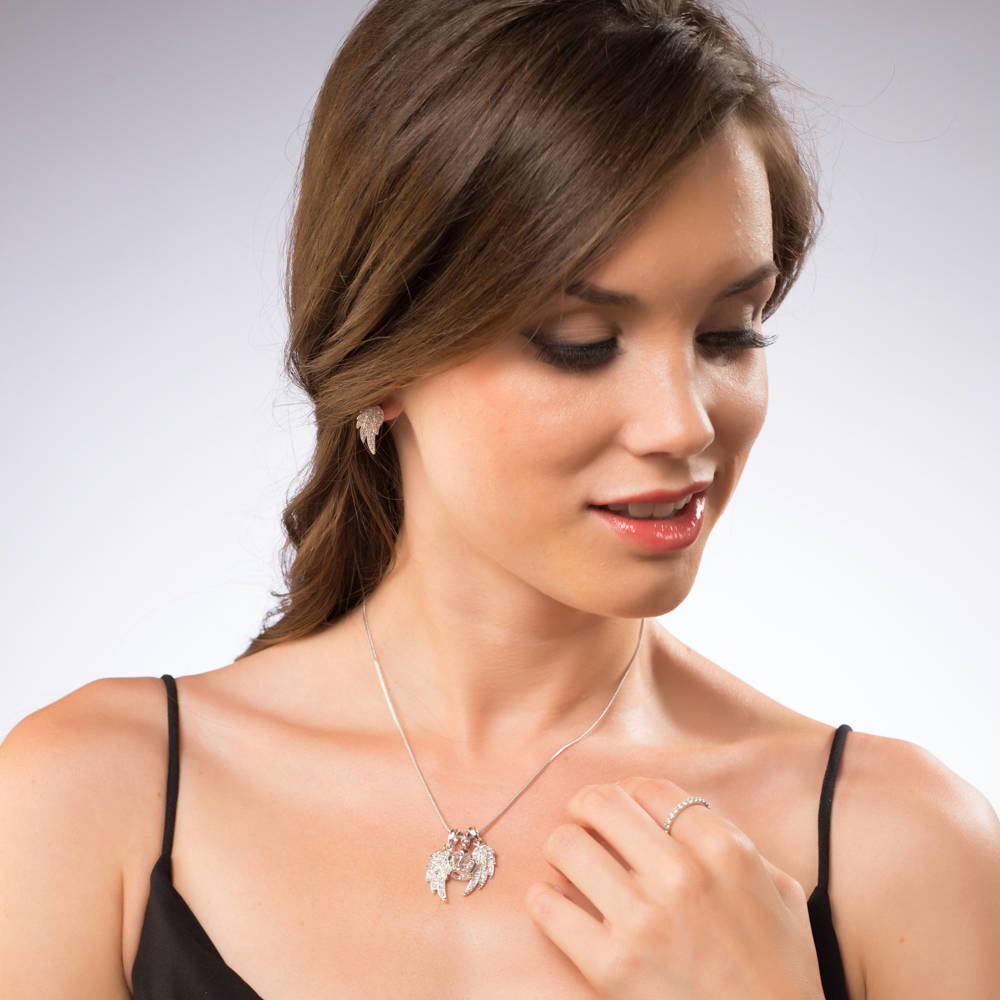 Model wearing Angel Wings CZ Necklace and Earrings Set in Silver-Tone, 3 of 9