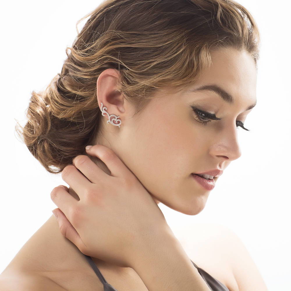 Model wearing Filigree CZ Ear Crawler Cartilage Earrings in Sterling Silver, 2 of 4