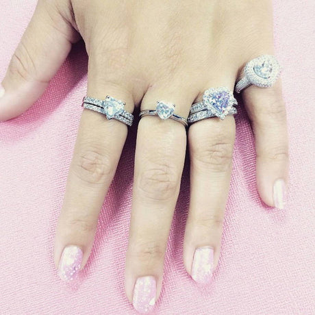 Model Wearing Half Eternity Ring, Halo Ring, Solitaire Ring, Solitaire with Side Stones Ring