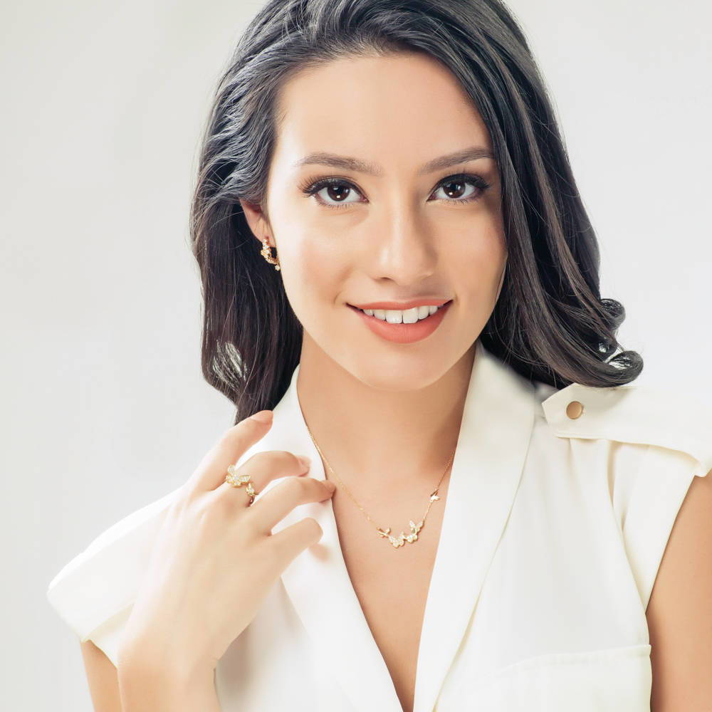 Model wearing Butterfly CZ Hoop Earrings in Gold Flashed Sterling Silver 0.8 inch, 2 of 4