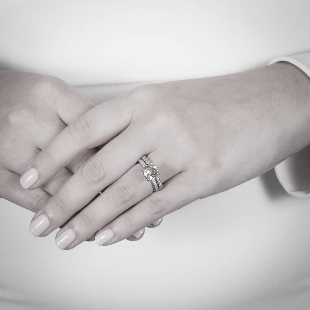 Model wearing Solitaire 3ct Canary Yellow Cushion CZ Ring in Sterling Silver, 8 of 19