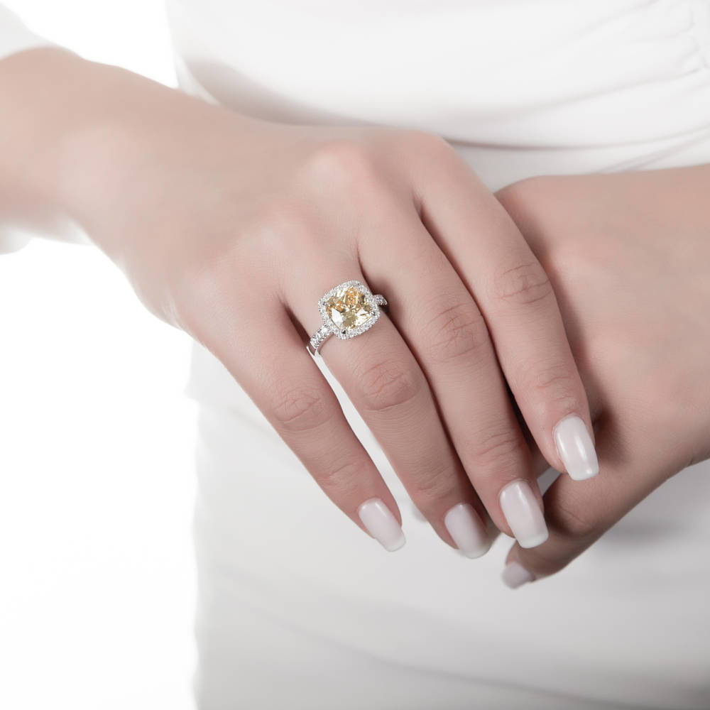 Model wearing Halo Canary Yellow Cushion CZ Ring in Sterling Silver, 2 of 15