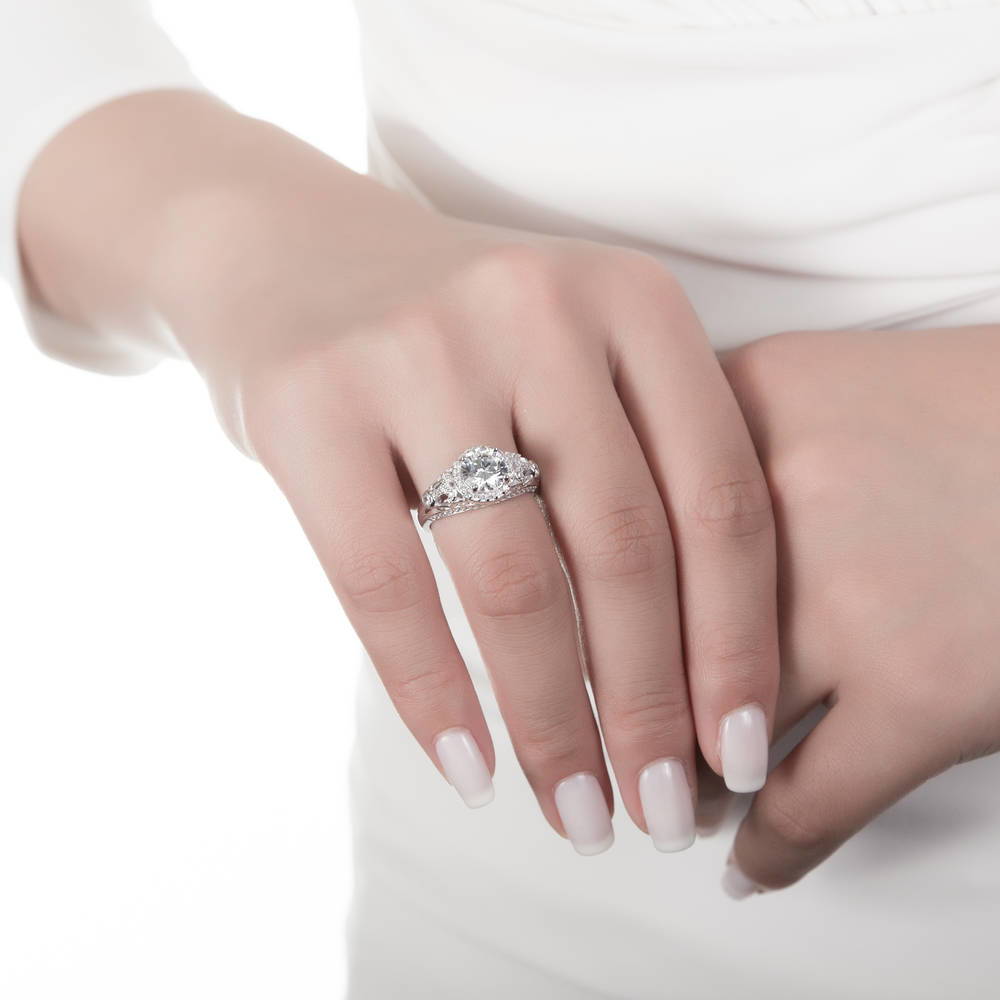 Model wearing Halo Art Deco Round CZ Ring in Sterling Silver, 3 of 8