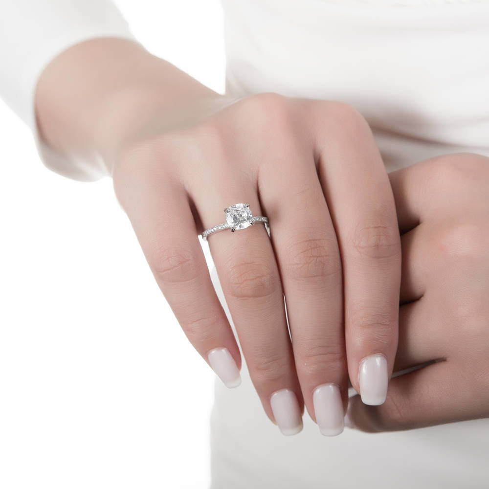 Model wearing Solitaire 3ct Cushion CZ Ring in Sterling Silver, 2 of 8