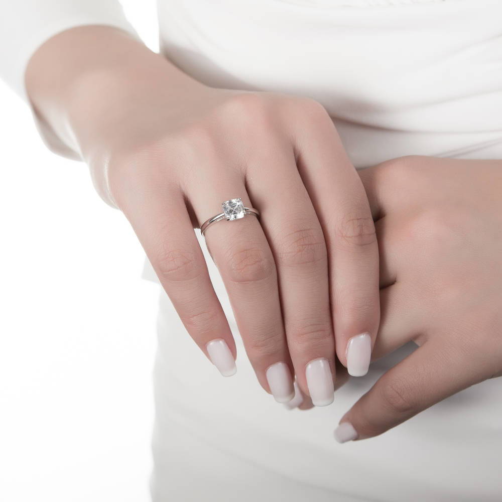 Model wearing Solitaire 2ct Asscher CZ Ring Set in Sterling Silver, 6 of 9