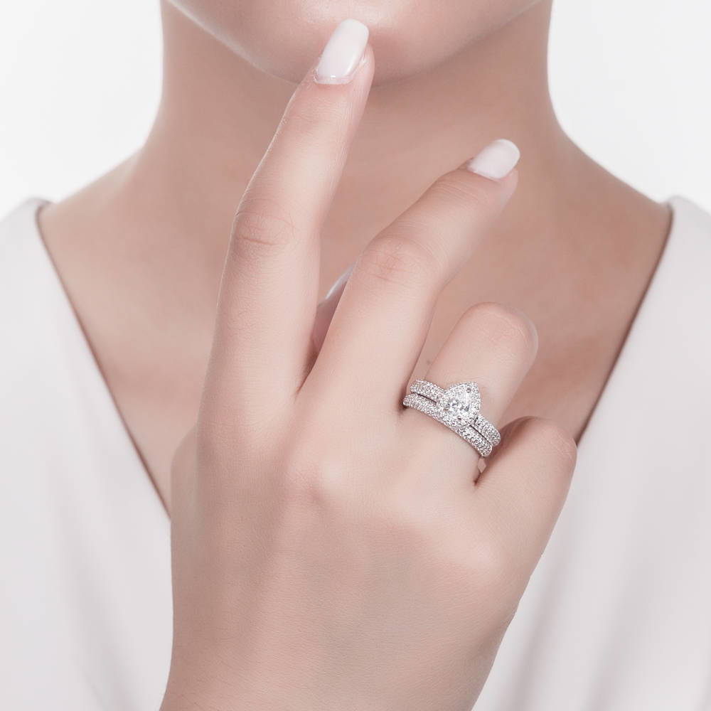 Model wearing Halo Pear CZ Ring Set in Sterling Silver, 2 of 9