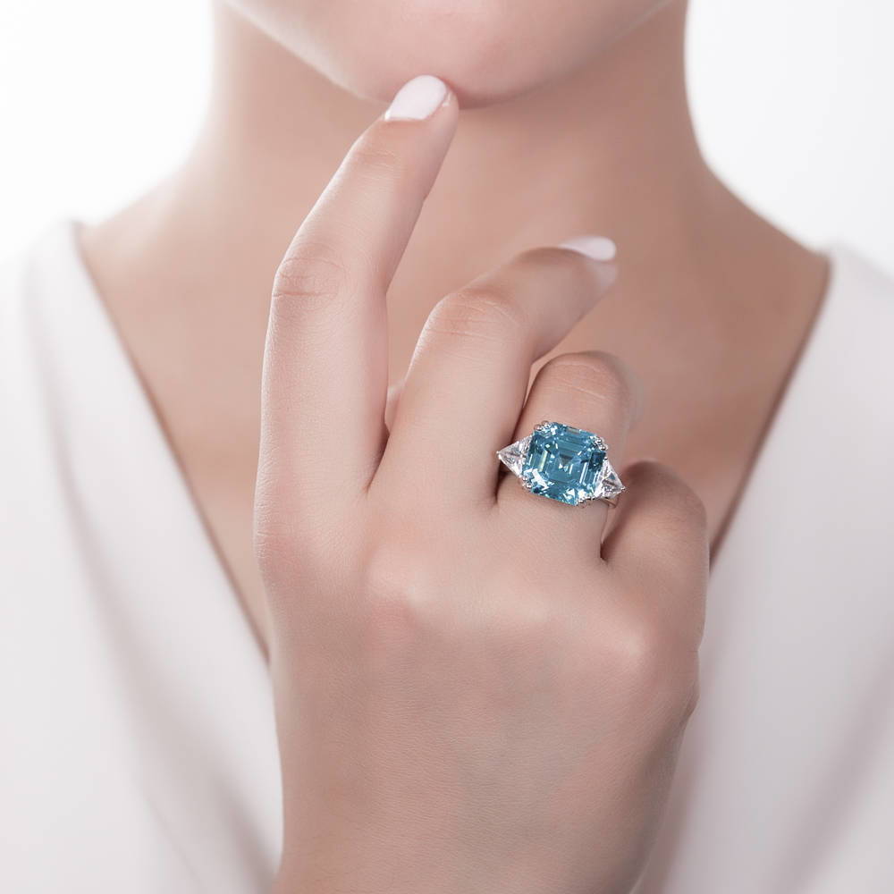Model wearing 3-Stone Blue Asscher CZ Ring in Sterling Silver 12.6ct, 2 of 7