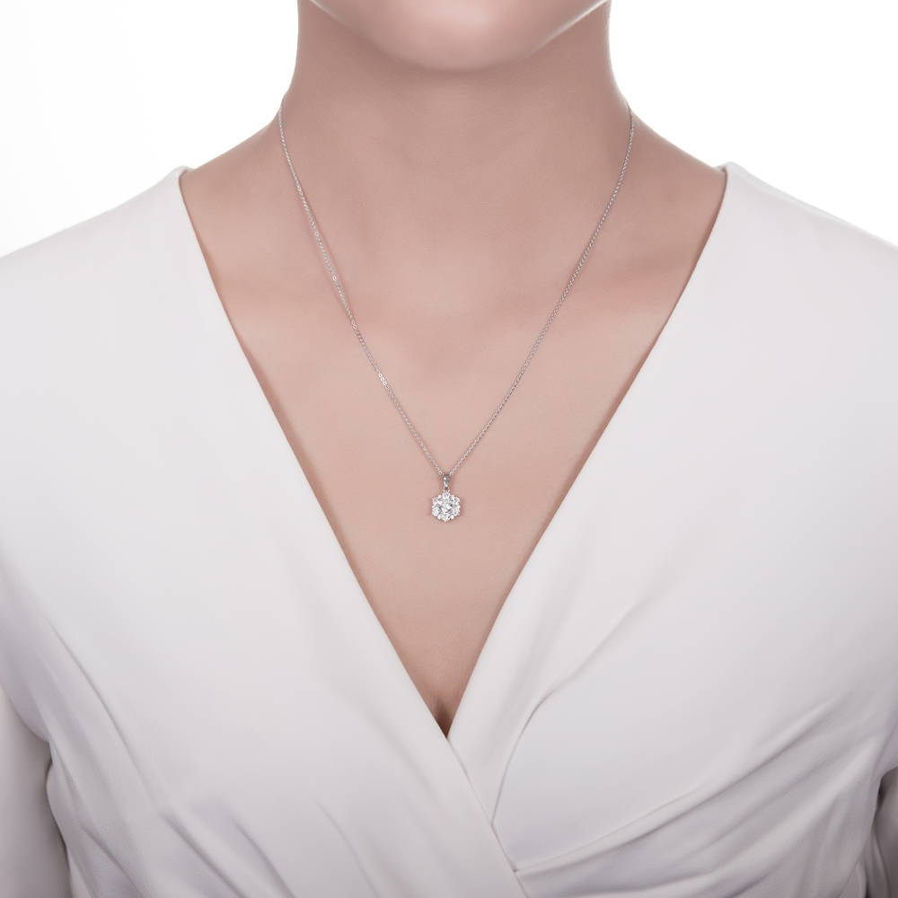 Model wearing Flower Halo CZ Necklace and Earrings Set in Sterling Silver, 11 of 15
