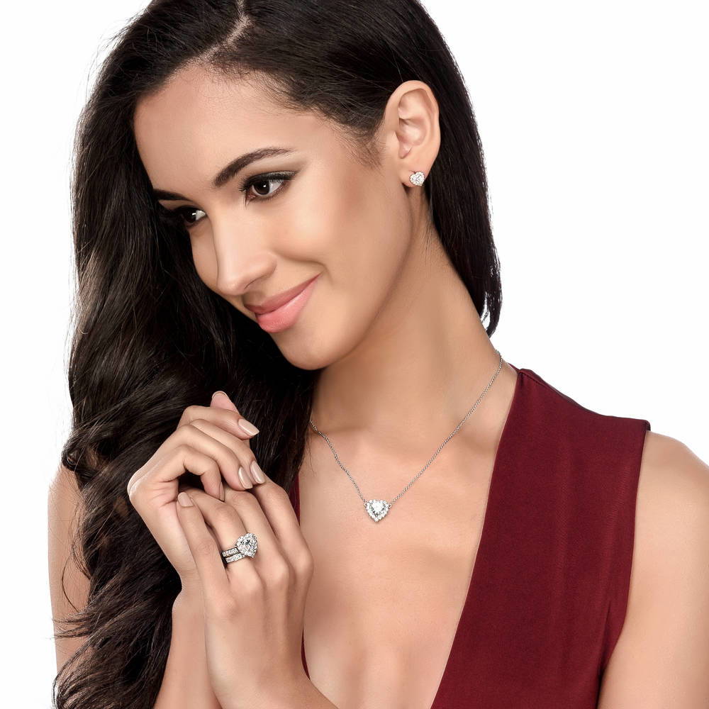 Model wearing Halo Heart CZ Statement Ring Set in Sterling Silver, 6 of 10