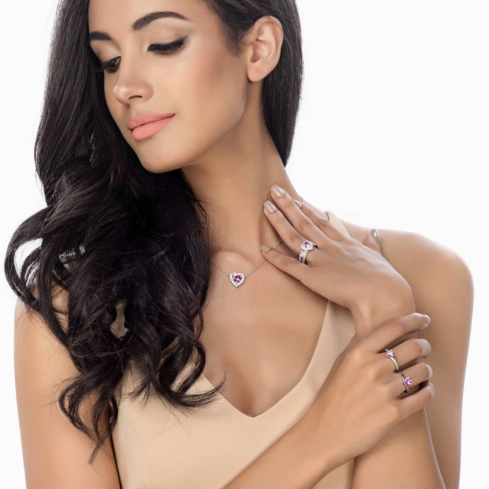 Model wearing Halo Heart Pink CZ Pendant Necklace in Sterling Silver, 5 of 7