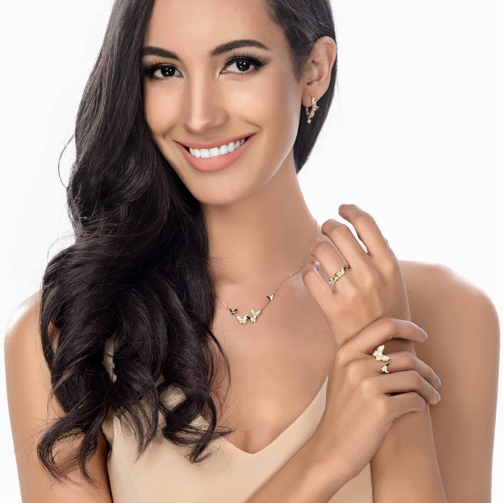 Model wearing Butterfly CZ Hoop Earrings in Gold Flashed Sterling Silver 0.8 inch, 3 of 4