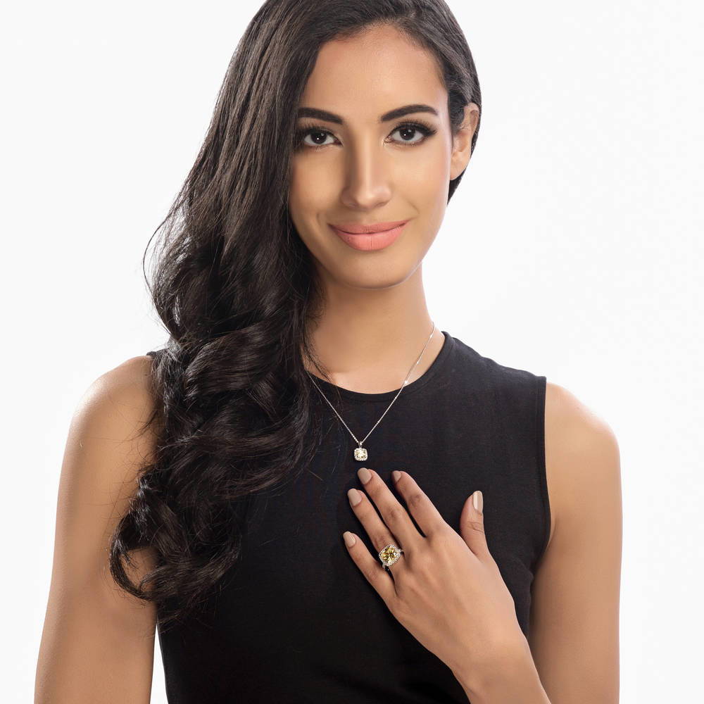 Model wearing Halo Canary Yellow Cushion CZ Ring in Sterling Silver, 10 of 15