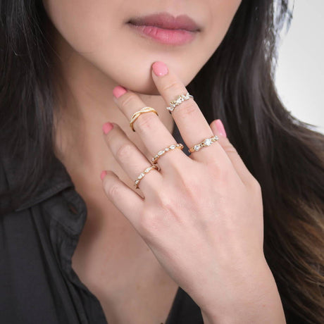 Model Wearing 3-Stone Ring, Bubble Eternity Ring, Butterfly Ring, Woven Eternity Ring