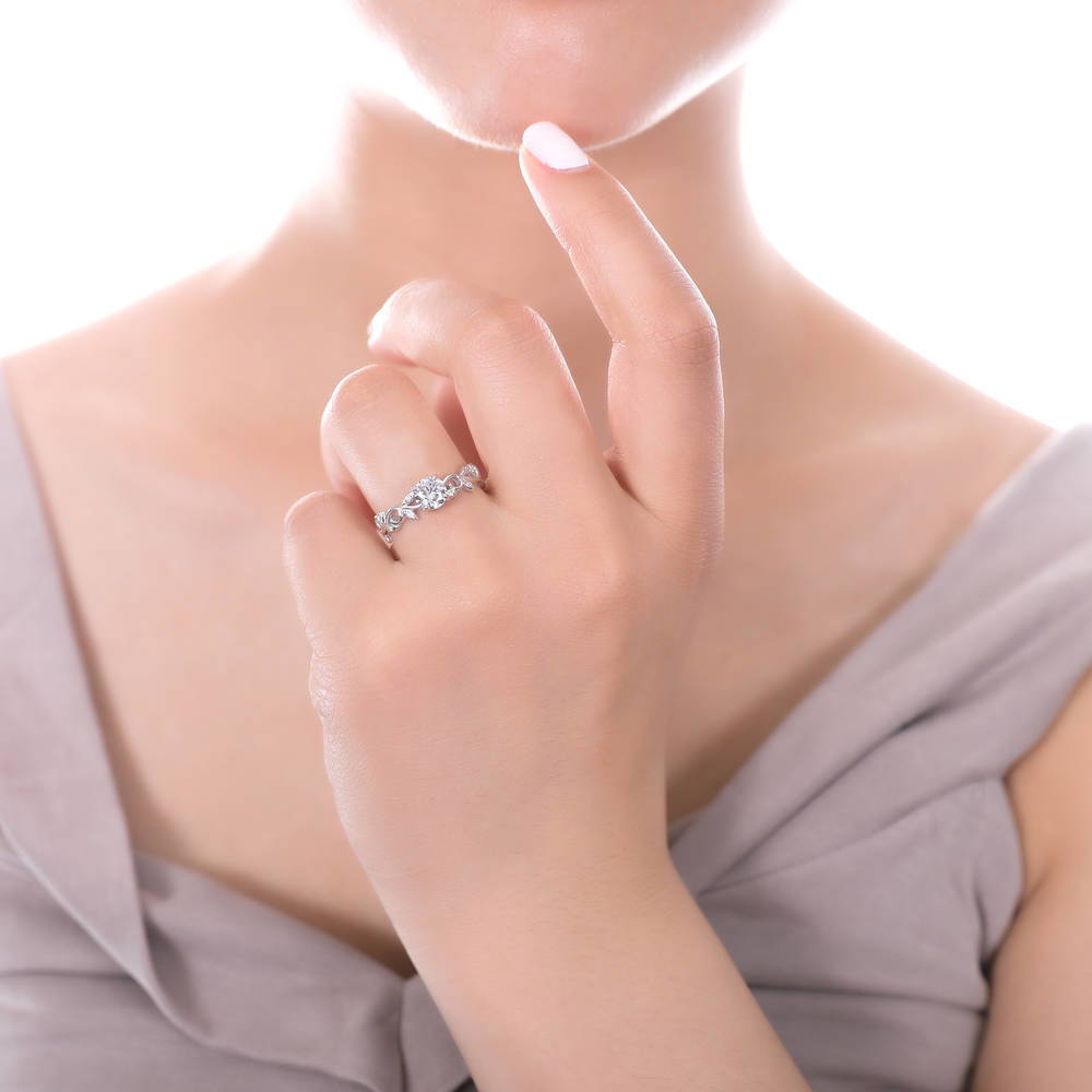 Model wearing Solitaire Leaf 0.8ct Round CZ Ring in Sterling Silver, 2 of 7