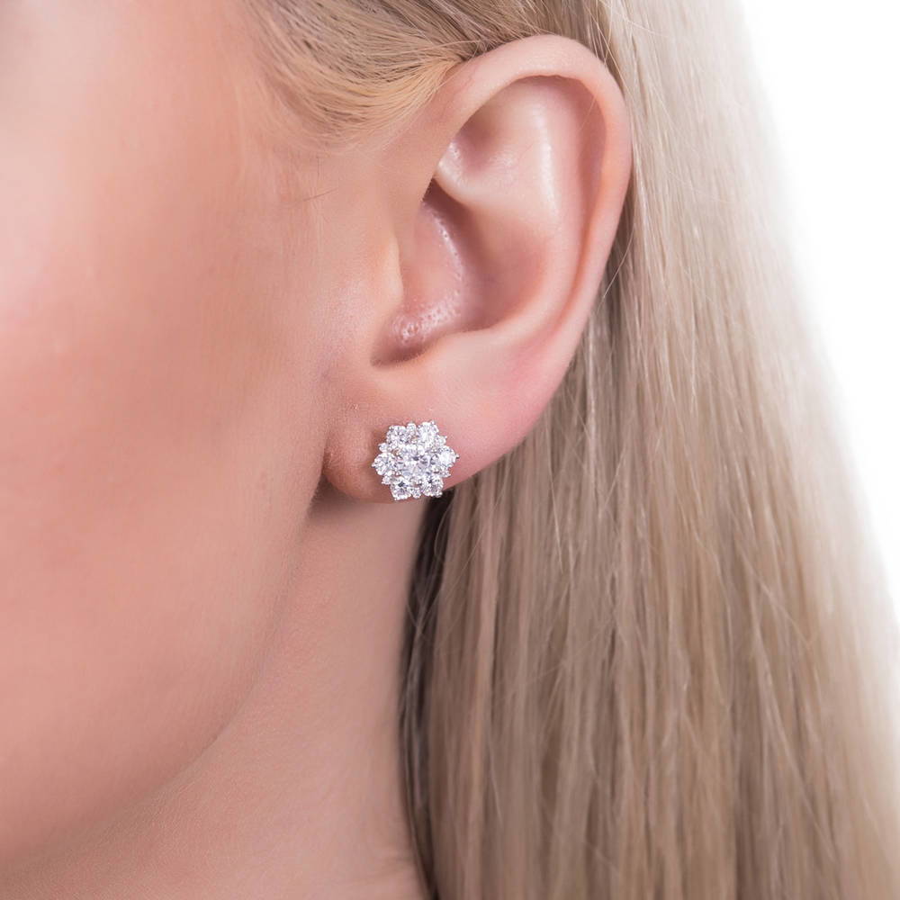 Model wearing Flower Halo CZ Stud Earrings in Sterling Silver, 5 of 10
