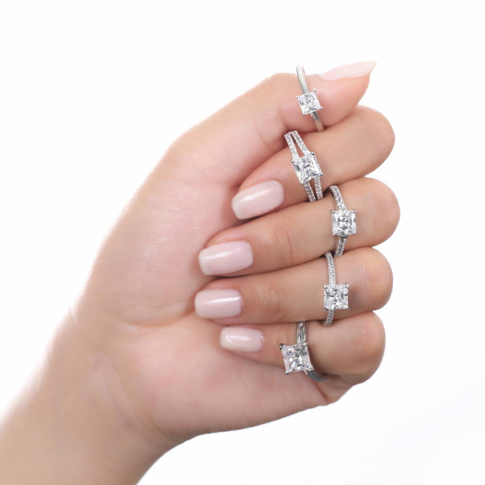 Model wearing Solitaire 2ct Princess CZ Split Shank Ring in Sterling Silver, 9 of 10