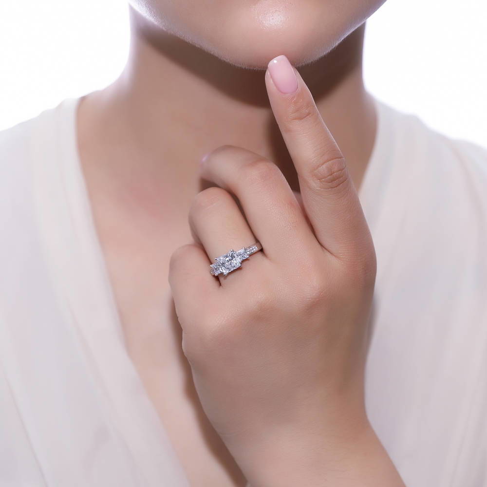 Model wearing 3-Stone 2ct Princess CZ Ring Set in Sterling Silver, 12 of 17