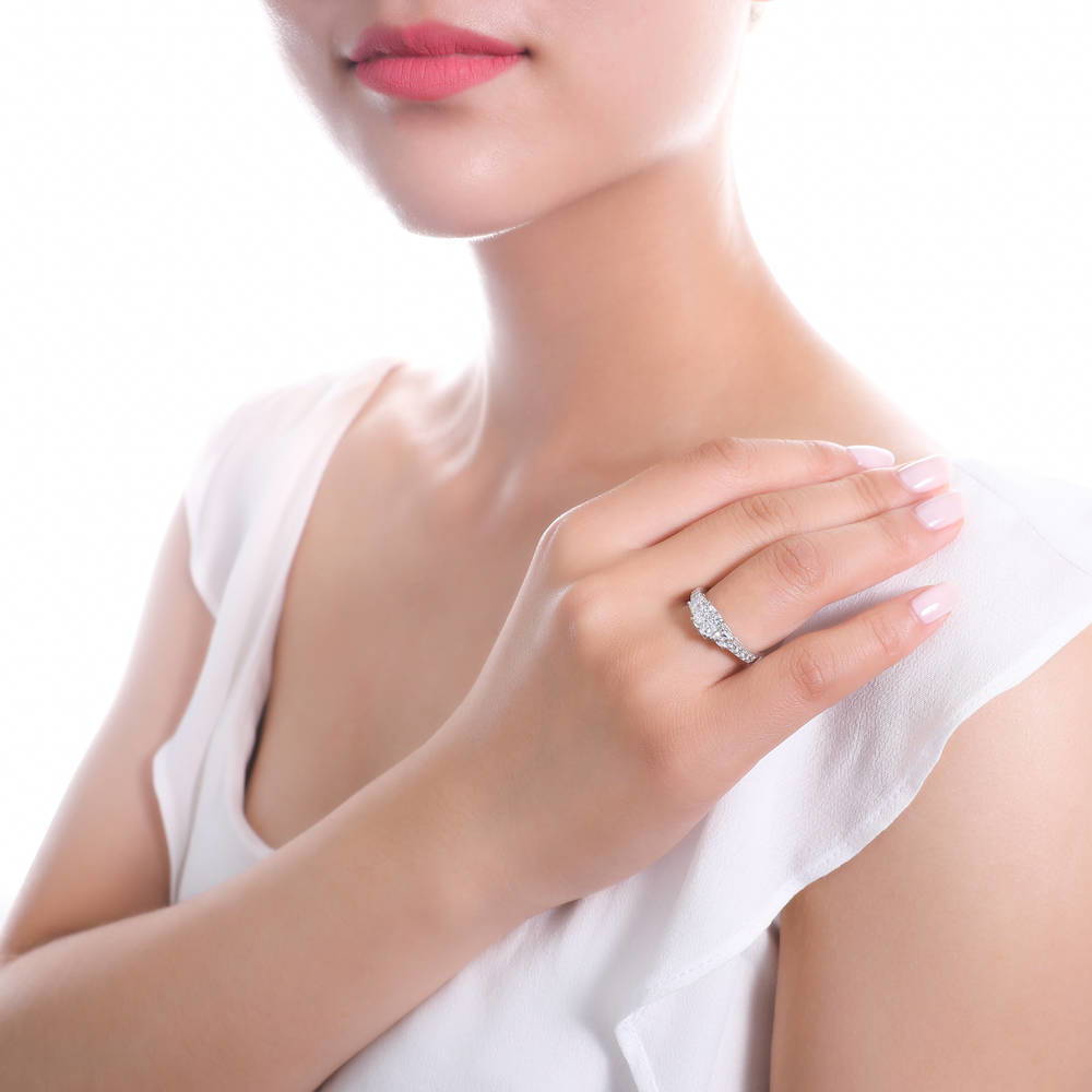 Model wearing 3-Stone 1.5ct Cushion CZ Ring in Sterling Silver, 6 of 8