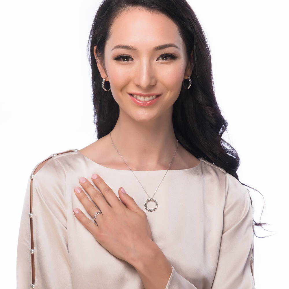 Model wearing Leaf Solitaire CZ Ring Set in Sterling Silver, 8 of 9