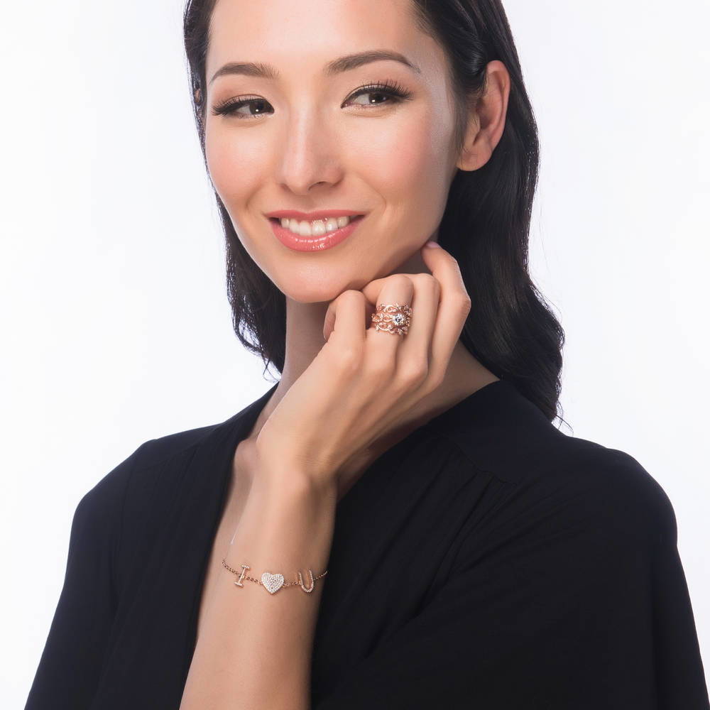 Model wearing Solitaire Filigree CZ Ring in Rose Gold Plated Sterling Silver, 3 of 8