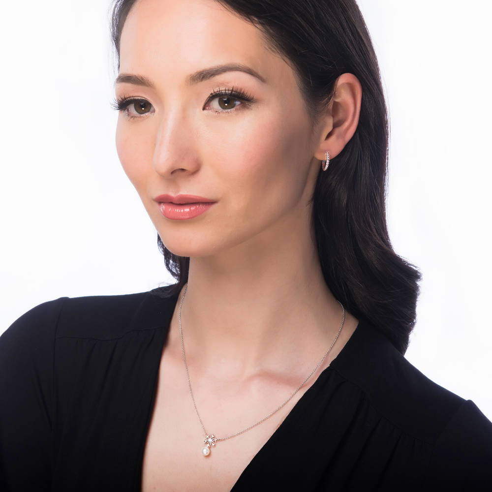 Model wearing Snowflake Imitation Pearl Necklace in Sterling Silver, 2 of 6