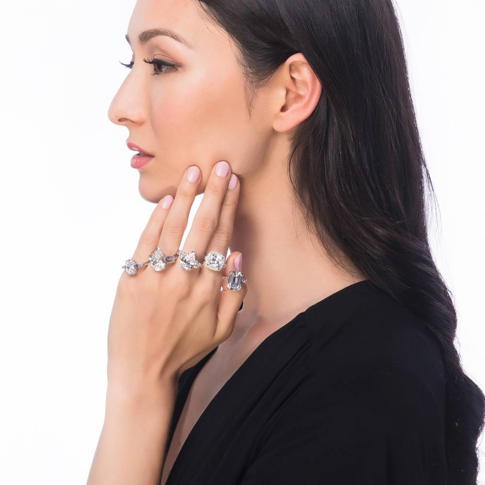 Model wearing 3-Stone 5.7ct Pear CZ Ring in Sterling Silver, 9 of 11