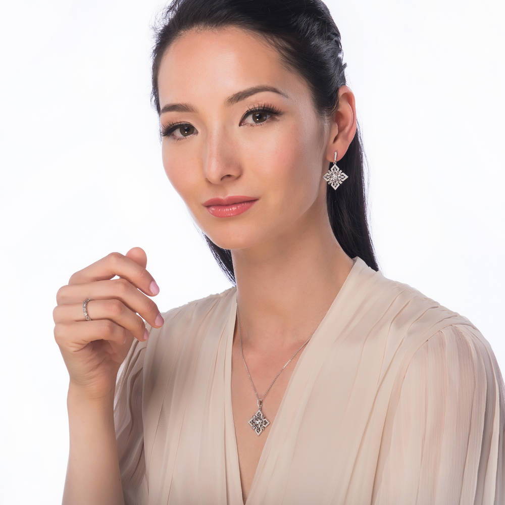 Model wearing Art Deco Bezel CZ Eternity Ring in Sterling Silver, 6 of 7