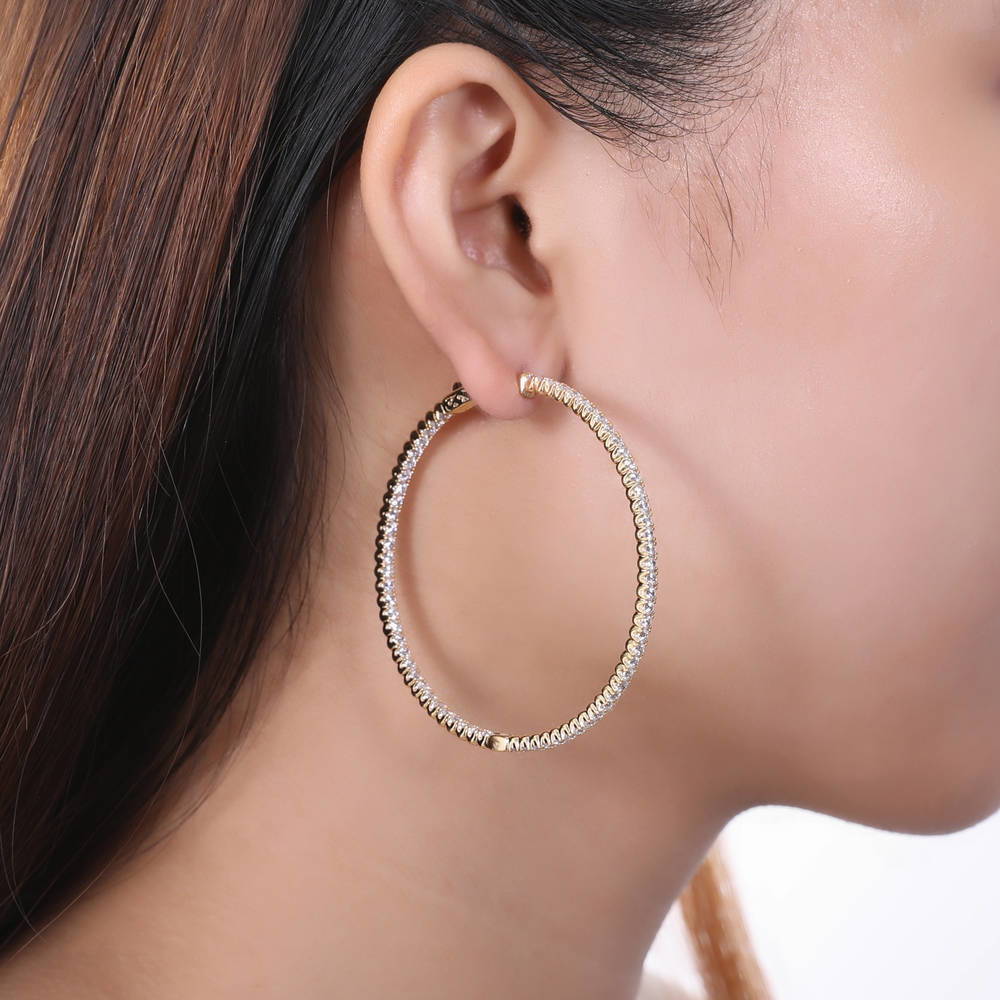 Model wearing CZ Large Inside-Out Hoop Earrings in Sterling Silver 2.2 inch, 7 of 15