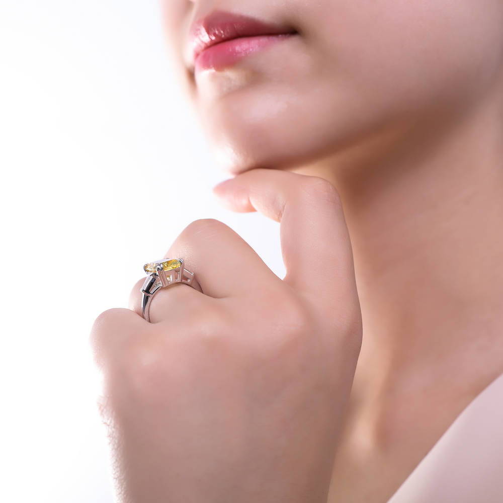 Model wearing 3-Stone Canary Yellow Cushion CZ Statement Ring in Sterling Silver, 5 of 10