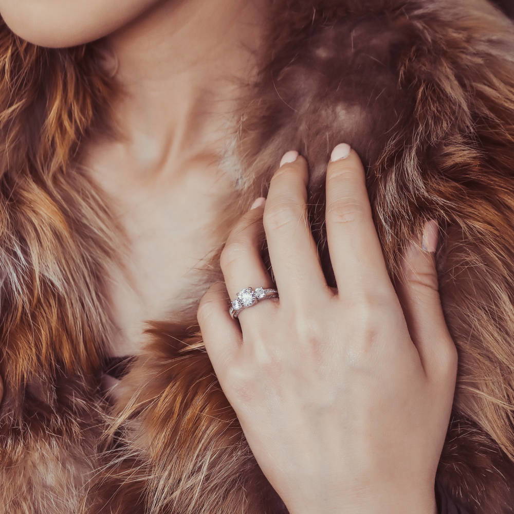 Model wearing 3-Stone Round CZ Ring in Sterling Silver, 6 of 12