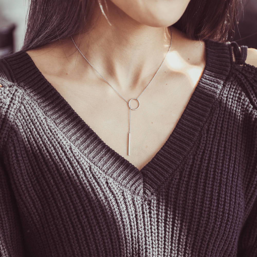 Model wearing Open Circle Bar Lariat Necklace in Sterling Silver, 2 of 6