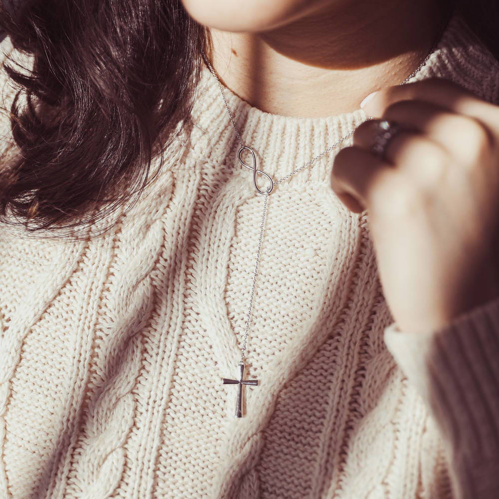 Model wearing Infinity Cross Lariat Necklace in Sterling Silver, 3 of 8