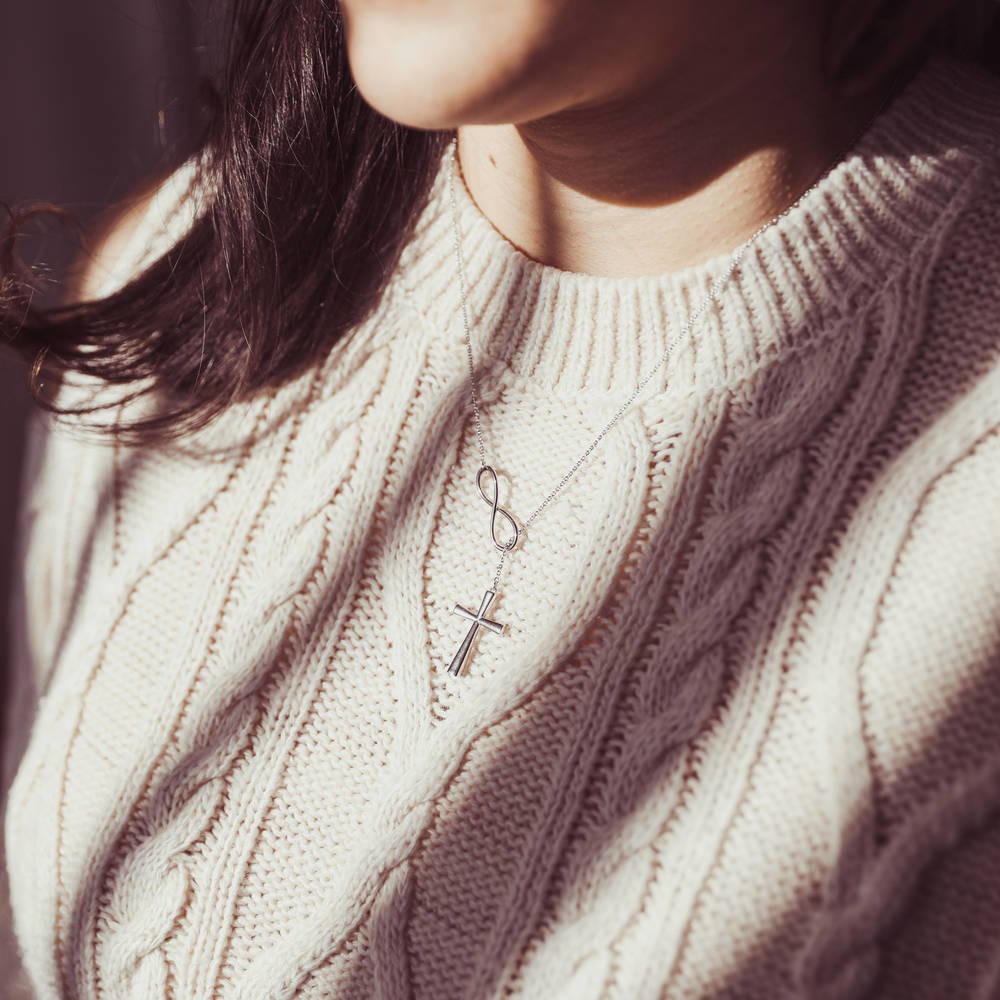 Model wearing Infinity Cross Lariat Necklace in Sterling Silver, 2 of 8