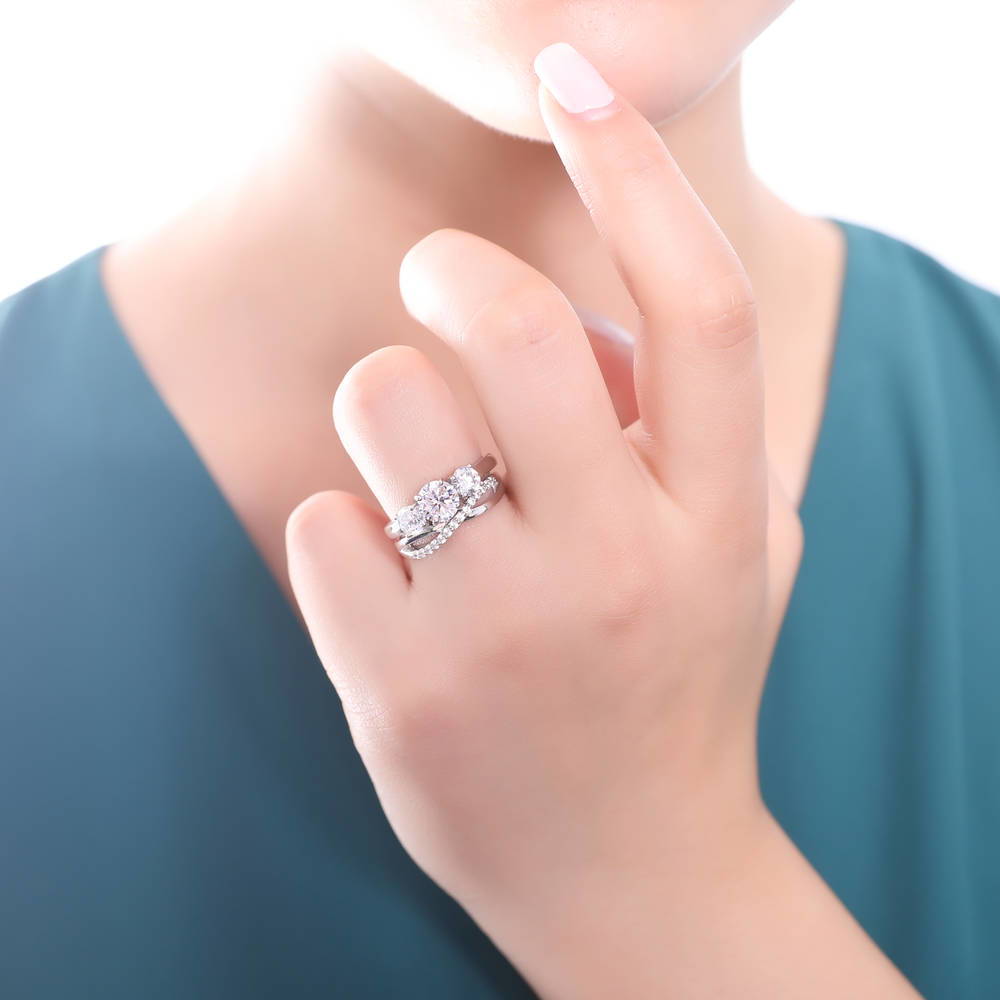 Model wearing 3-Stone Criss Cross Round CZ Ring Set in Sterling Silver, 2 of 14