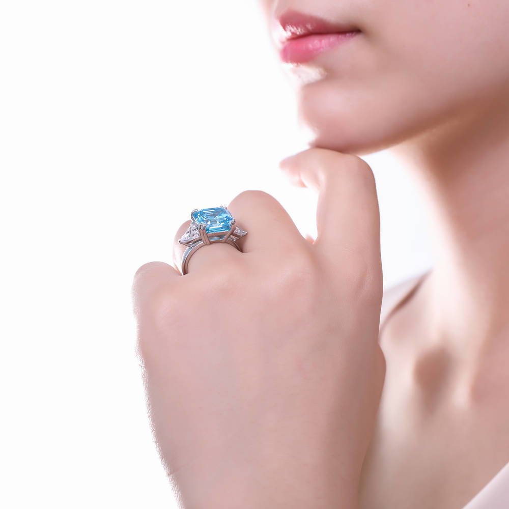 Model wearing 3-Stone Blue Asscher CZ Ring in Sterling Silver 12.6ct, 3 of 7