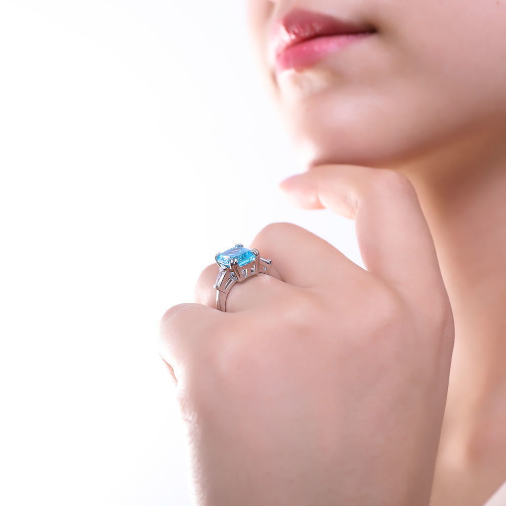 Model wearing 3-Stone Blue Cushion CZ Statement Ring in Sterling Silver, 2 of 8