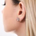 Model wearing Solitaire Cushion CZ Stud Earrings in Sterling Silver, 6mm