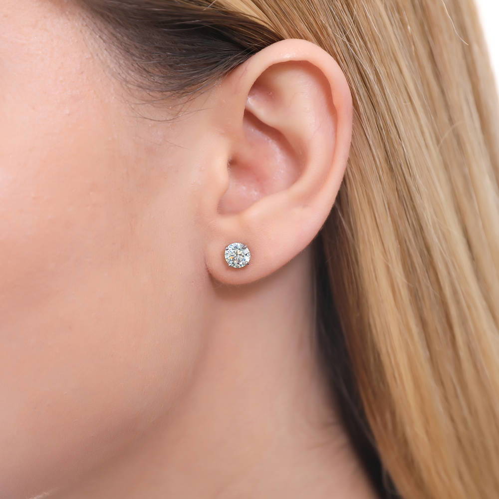 Model wearing Solitaire Round CZ Stud Earrings in Sterling Silver 1.6ct, 2 of 13