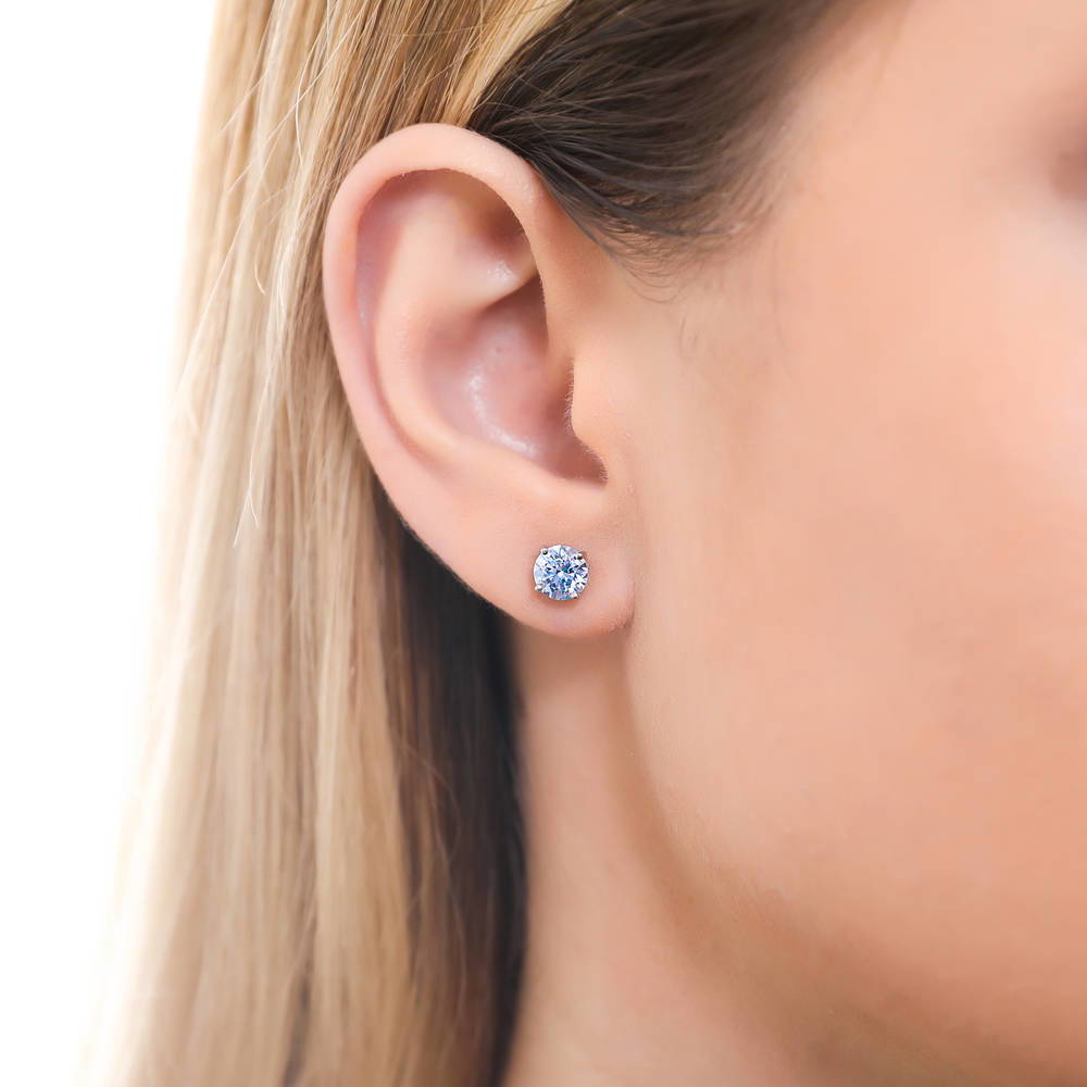 Model wearing Solitaire Round CZ Stud Earrings in Sterling Silver 1.6ct, 3 of 13