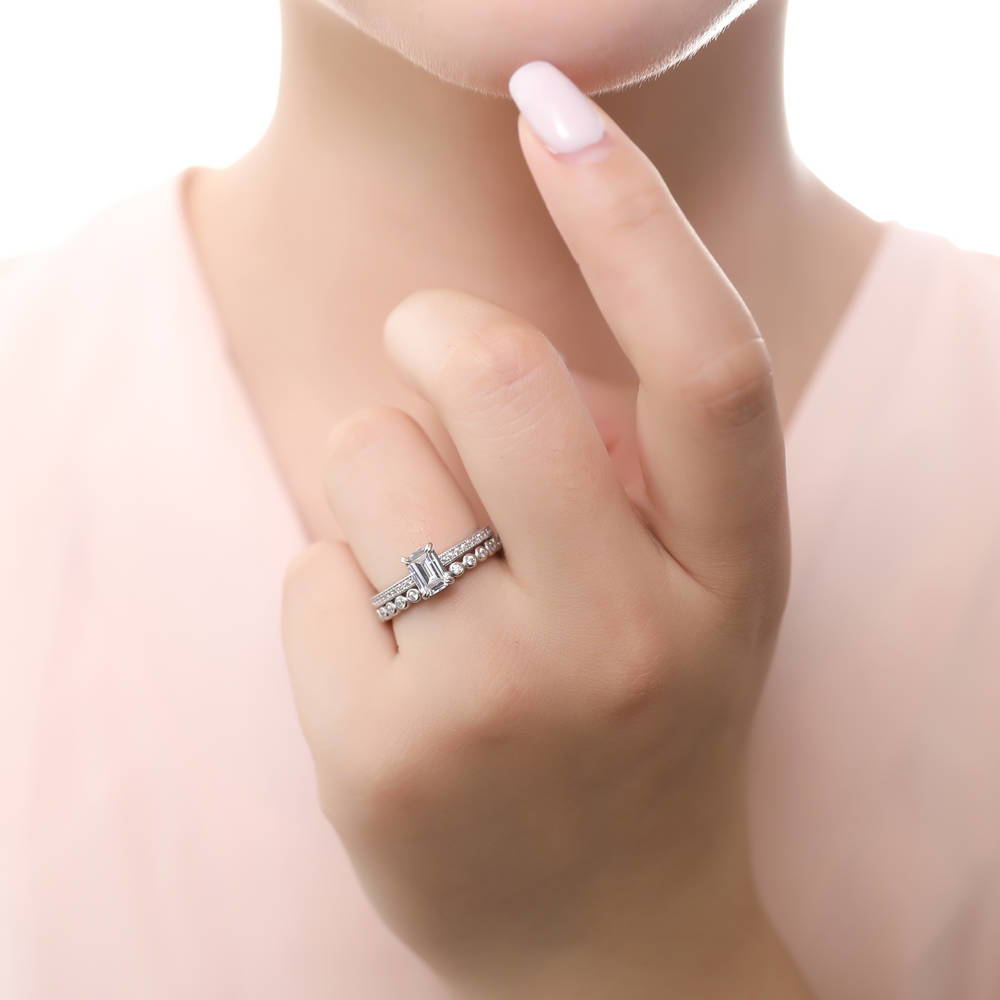 Model wearing Solitaire 1ct Emerald Cut CZ Ring Set in Sterling Silver
