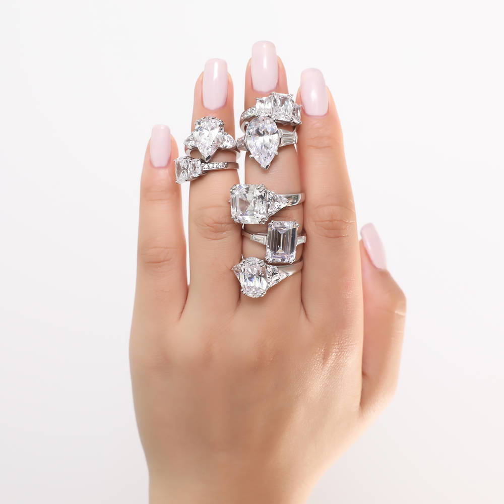 Image Contain: Model Wearing 3-Stone Ring, Solitaire with Side Stones Ring
