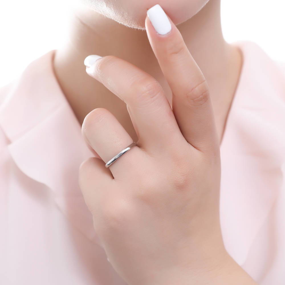 Model wearing 3-Stone East-West 1ct Emerald Cut CZ Ring Set in Sterling Silver, 12 of 13