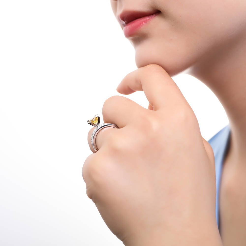 Model wearing Solitaire Canary Yellow Cushion CZ Ring Set in Sterling Silver, 3 of 10